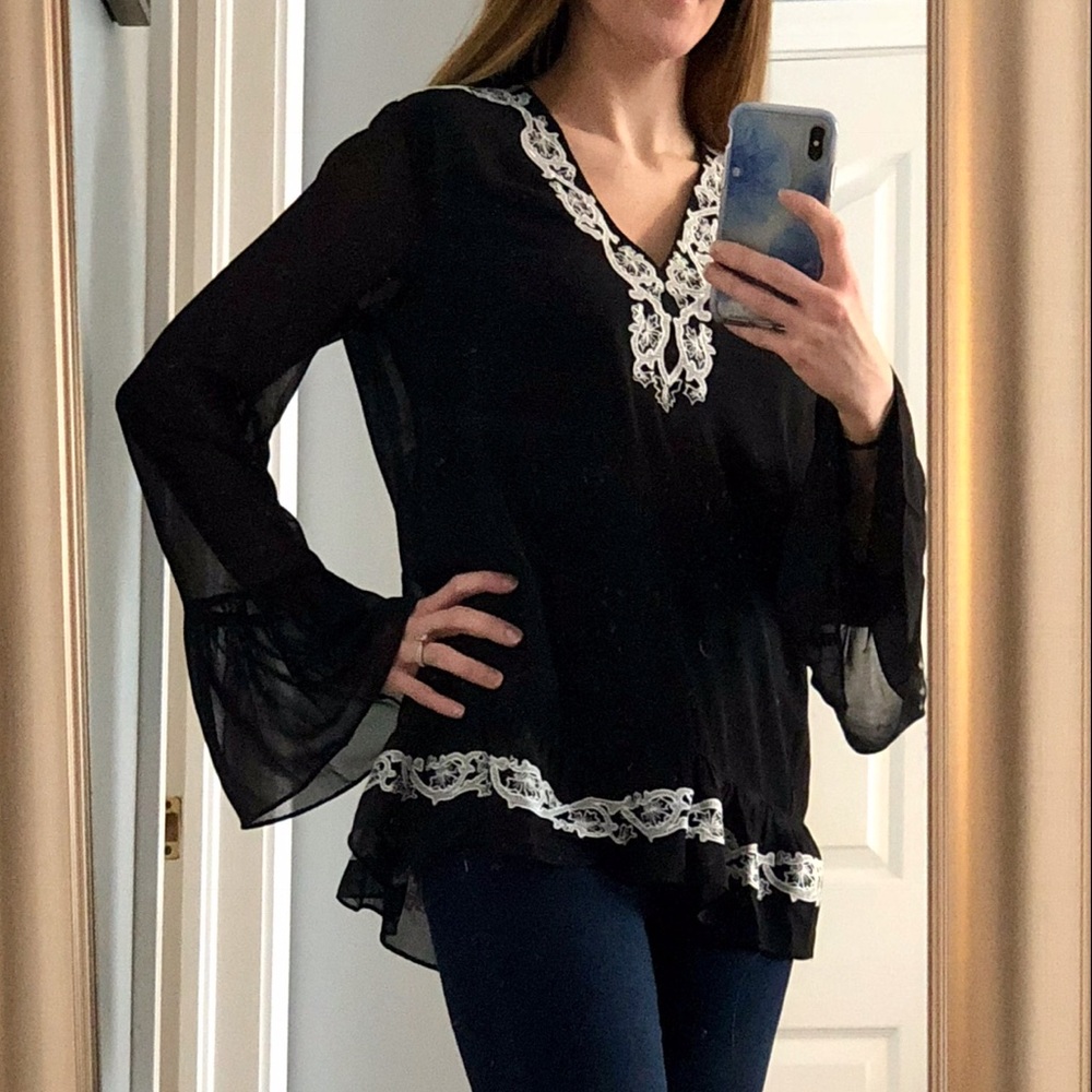 Black blouse with bell sleeves; NWT; sizes S,M,L
